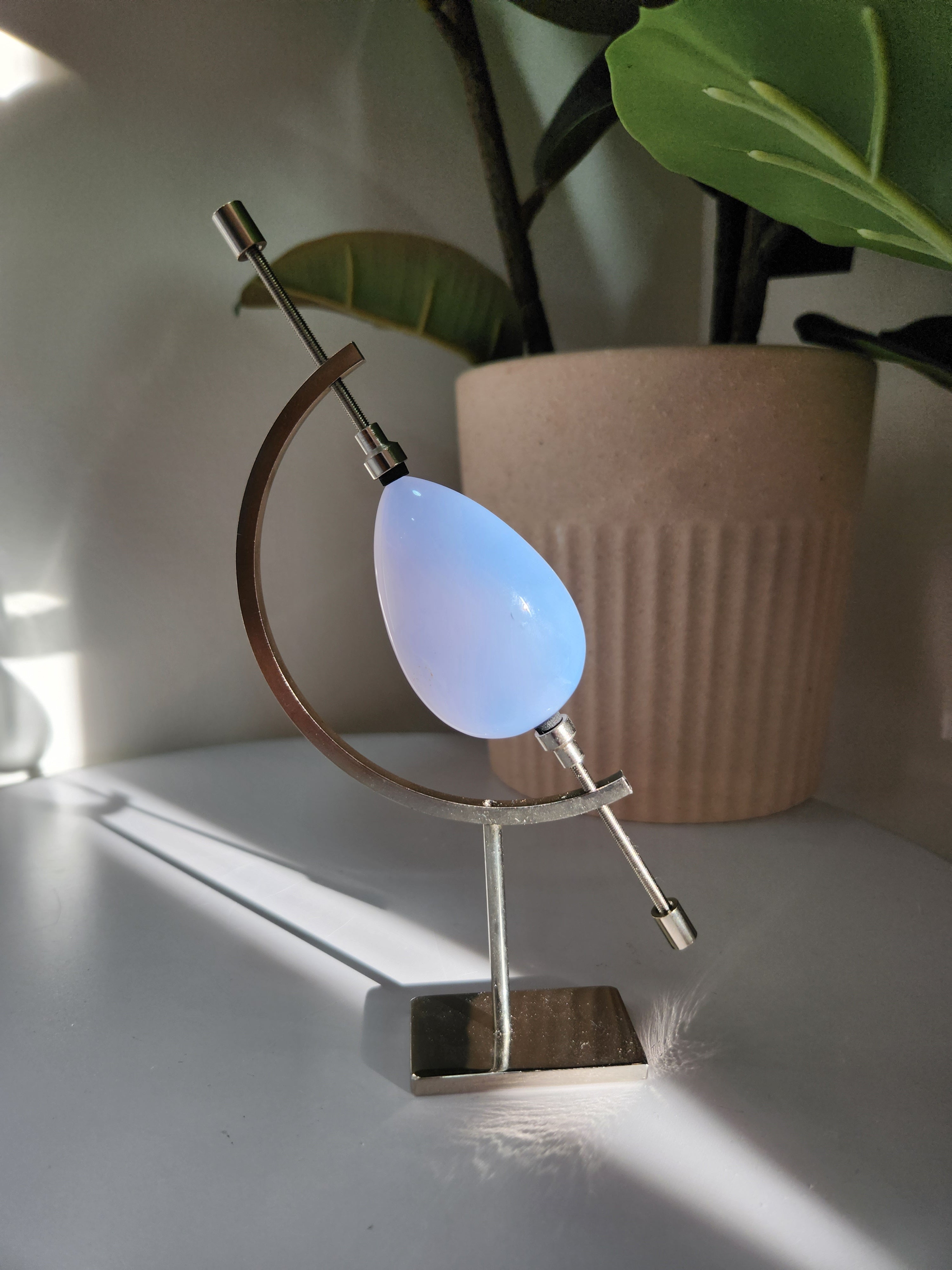 Blue Chalcedony Teardrop on Caliper Stand 001