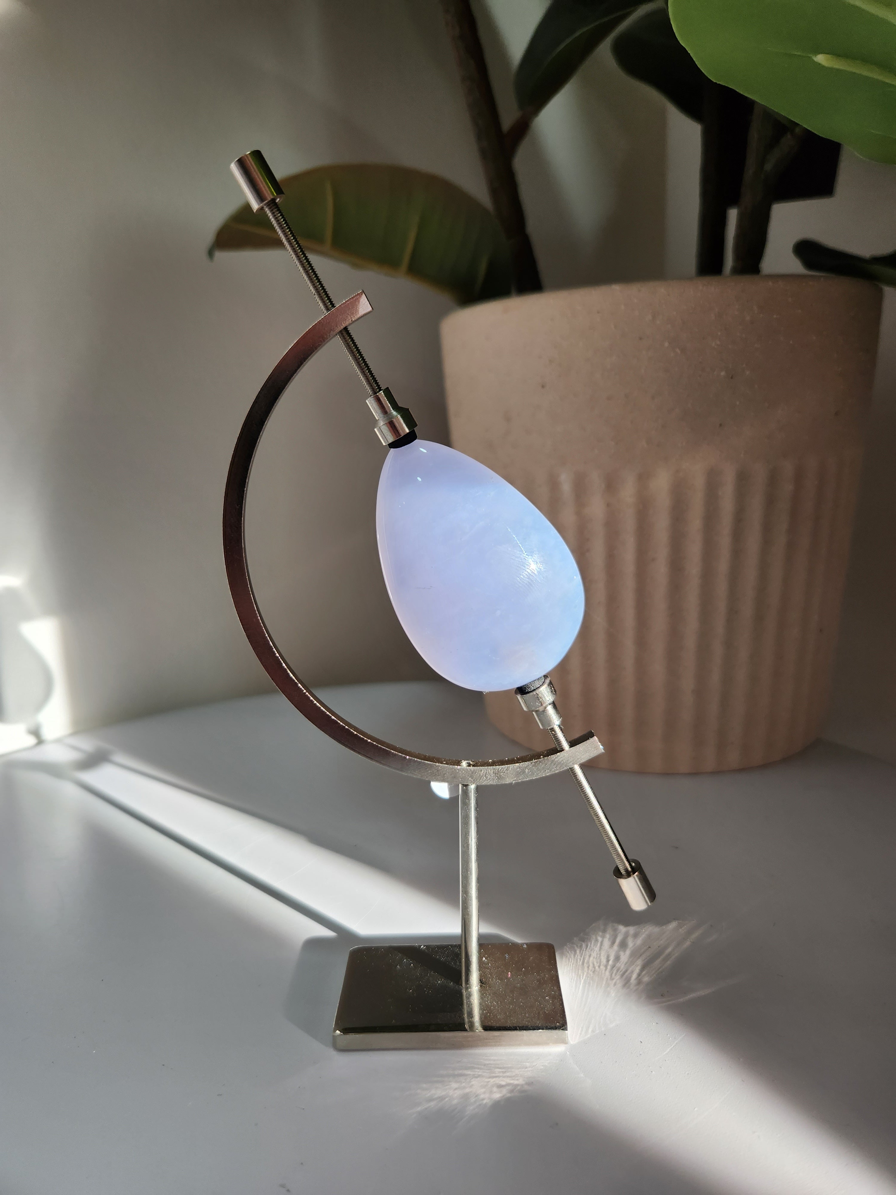 Blue Chalcedony Teardrop on Caliper Stand 002