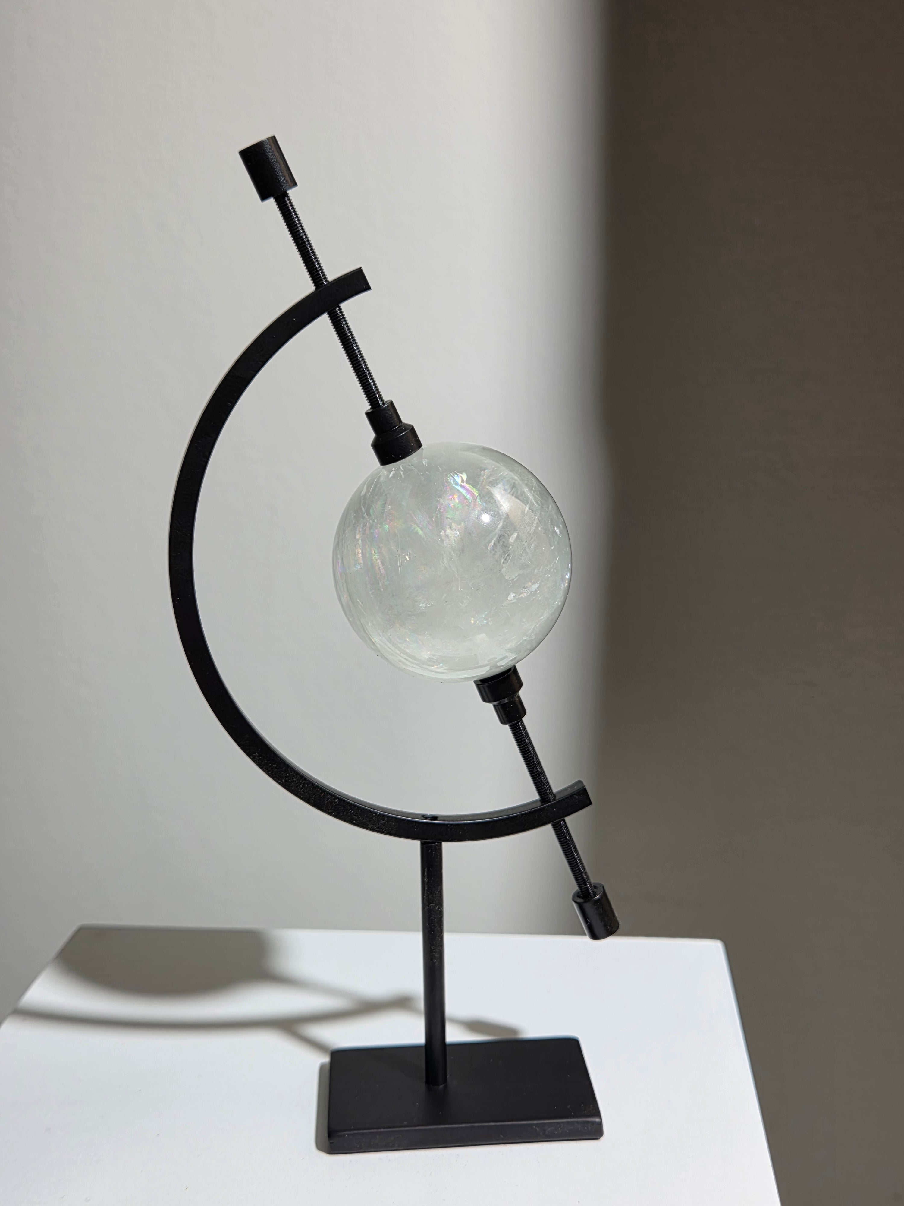 Optical Calcite Sphere on caliper | intuitively selected
